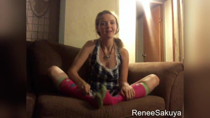 Renee Sakuya: Tickling feet indoors on couch with toothbrush, wearing long knee...