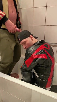 Big Man in Leather Jacket Pissing on Leather Moto Biker