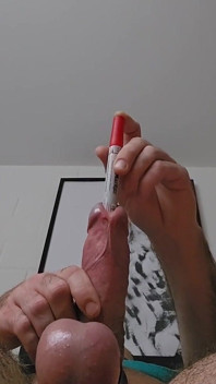 Sounding an Eding Pen While Stretching My Testicles