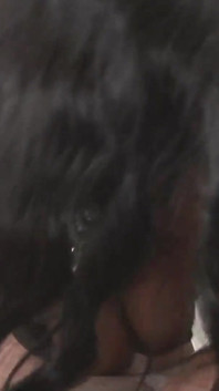 Two ebony women with natural tits give a blowjob to a black cock that cums in their mouth