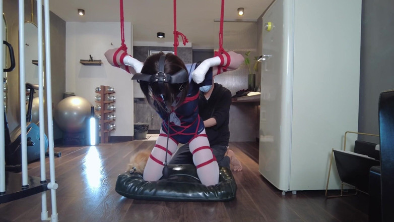 Aisan girl bondage: Mz31 - a Girl Tied and Suspended by a Red Rope...