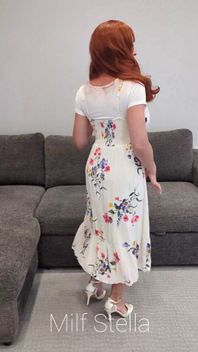 A Redhead in a Dress