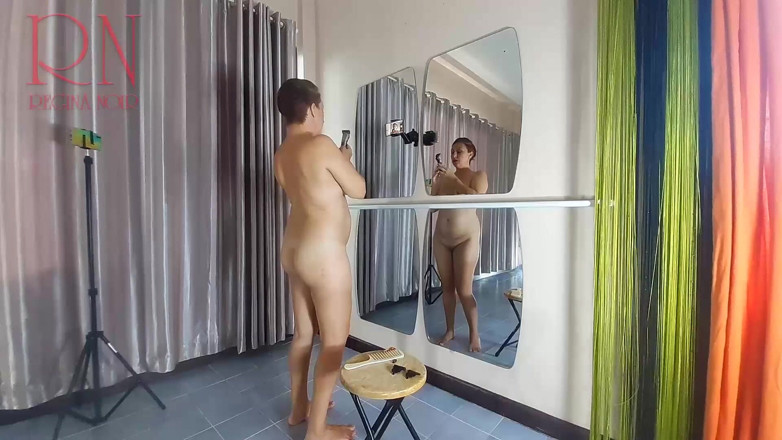 Regina Noir: Naked nudist hairdresser. She cuts her own hair. Regina Noir...