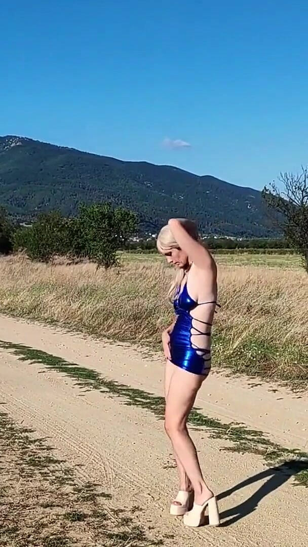 Za Za: Slave Tih Ie Walks in the Blue Dress