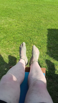 Barefoot Waiting for the Tide on the Beach