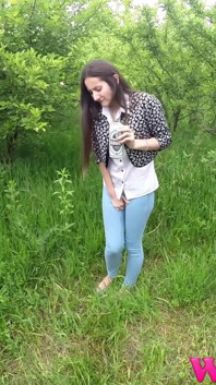 Skinny Brunette with Full Bladder Has to Pee in the Forest and Wet the Tall Grass Touching Her Wet Pussy