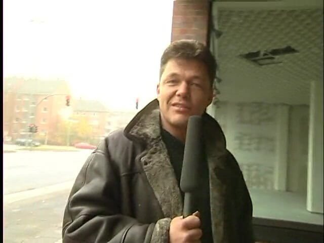 Lucky Cooch: A short-haired German girl was interviewed outdoor.