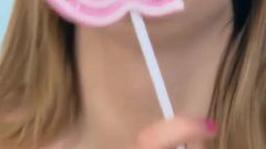 Marvelous blonde with perfect body touches her cunt with sweet candy