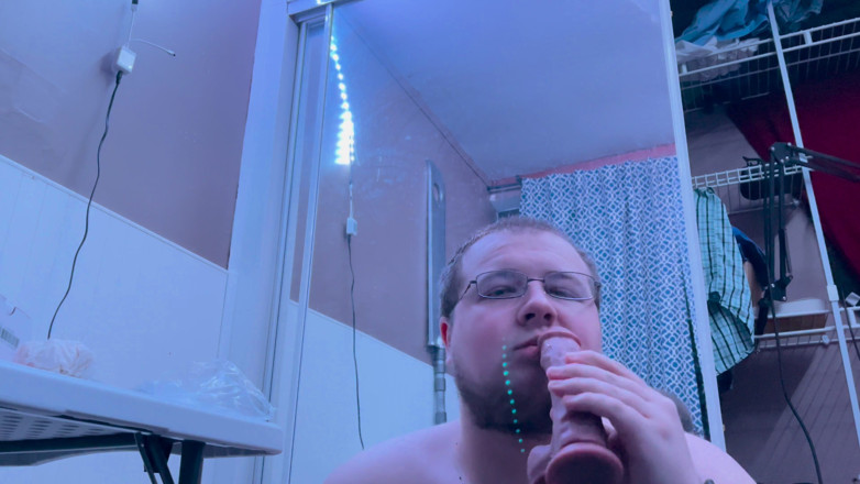 Chubbybidude: Chubby gay guy practices oral on black dildo