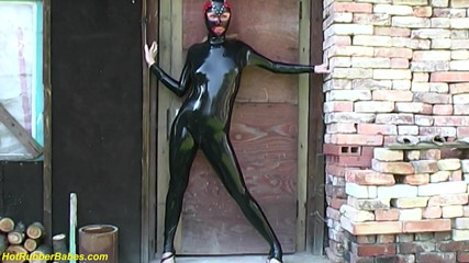 Fetish Islands: Young flexi latex teen stretching outdoor