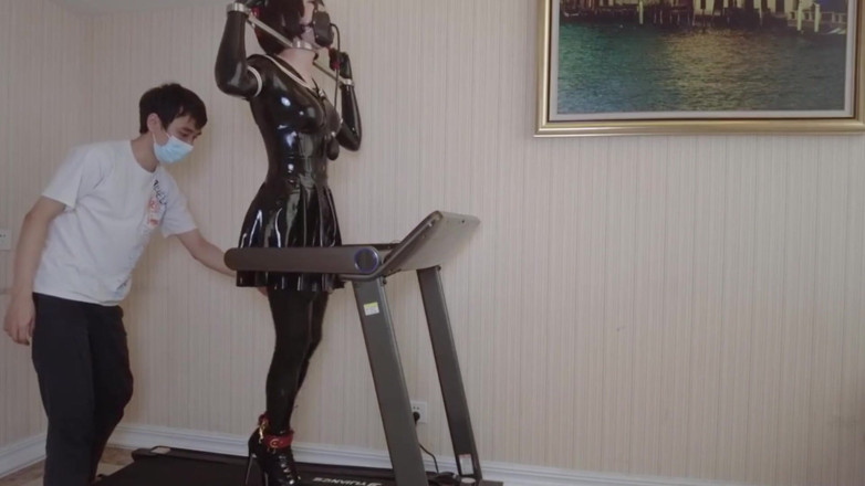Aisan girl bondage: Mz24 - a Girl Bound to a Treadmill with Metal Restraints...