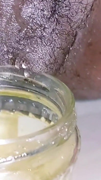 Micro Penis Pissing in Bottle Again and Again Until It Full Later to Use as Cold Drink