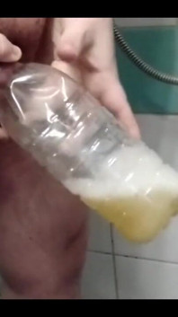 Superchub Pissing in Bottle
