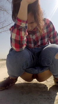 Desperate Babe with Full Bladder Empty Her Bladder and Pee on a Dirt Road