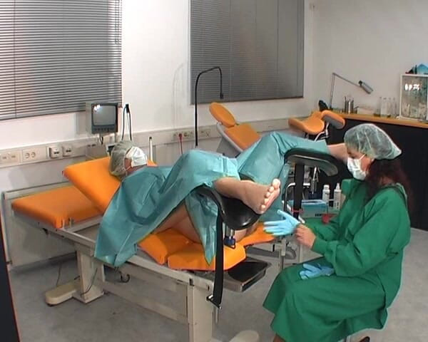 Rubber & Clinic Studio - 1ATOYS: Nurse in green surgery outfit