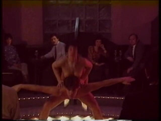 Irresistible Strippers: Blonde stripper bends showing shaved pussy