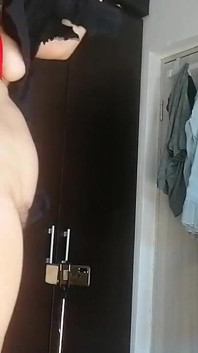 Sexy Latina Having Fun Trying on Clothes and Cutting Them