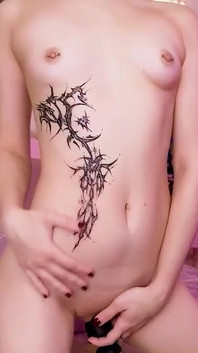 Naked Girl Plays with a Vibrator on Camera
