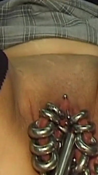 Redhead MILF Shows off Her Extreme Piercings
