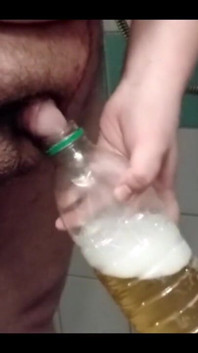 Superchub Pissing in Bottle