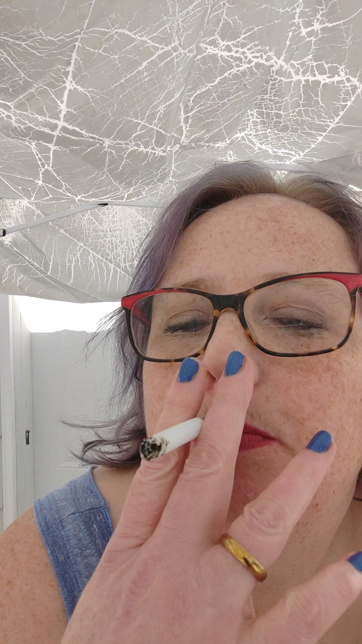 AngYourDirtyCanadian: Calm Outdoor Smoking Moment with a Playful Lipstick Look
