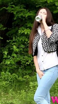 Desperate Brunette Feels Her Bladder so Full She Is in Danger of Pissing in Her Jeans in the Woods