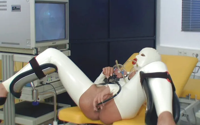 Rubber & Clinic Studio - 1ATOYS: Kinky rectal exam with scope in rubber