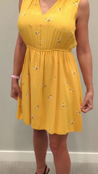 Stella in a Yellow Sun Dress with Black Heels