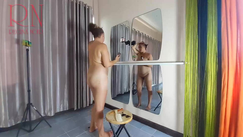 Regina Noir: Naked nudist hairdresser. She cuts her own hair. Regina Noir...