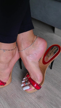 Red Heels and White Nails