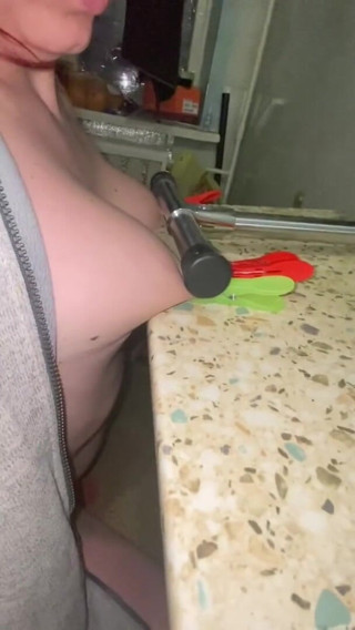 Elena917: tits with clamps and pressing - solo