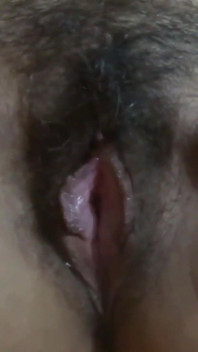 Latina shows off her big hairy pussy very excited, she needs cock