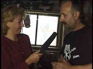 Lucky Cooch: Blonde interviewing a blacksmith
