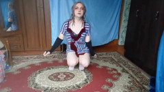 Cute Femboy Twirling Hair While Lying on Bed
