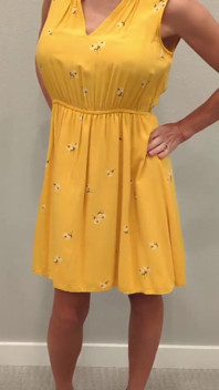 Stella in a Yellow Sun Dress with Black Heels