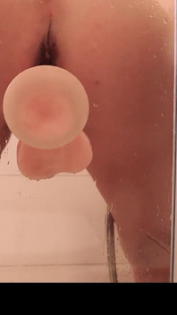 Shower Head Masturbation and a Dildo Deep Inside Her Pussy Gets Her to an Intense Orgasm
