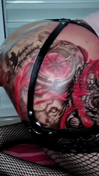 Huge Red Dildo Destroying the Ass of the Tattooed Shemale