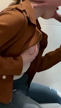 Busty Blonde Sucks Cock in the School Bathroom