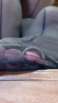 Goddess with Long Legs and Big Ass in Black Pantyhose on the Table Plays with a Toe Ring Above Your Face