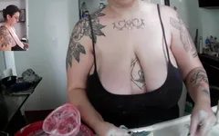 Tattoed MILF Doing the Dishes with Too Much Cleavage