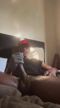 Masturbating