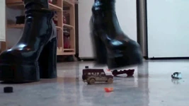 Crushing small toy trucks