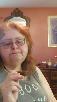 BBW nurse Vicki enjoys eatting a chocolate vanilla ice cream popsiscle