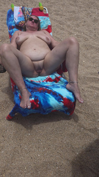 Laying with My Shaved Big Pussy Spread Wide Open on the Nude Beach to Tease Those Walking by and Looking BBW Swinger Wife Feet