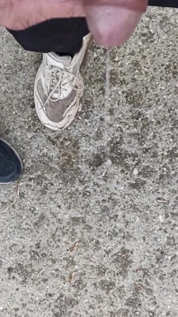 Friend Is Holding My Cock While Im Peeing on the Ground Outdoor