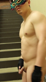 Flexing by the Stairs at the Gym