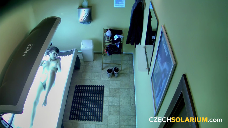 Czech Solarium: Czech Solarium 39: Dark-haired Babe Strips Down and Flashes Her Pussy