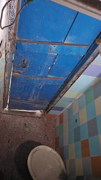 Construction Site Bathroom and Workers