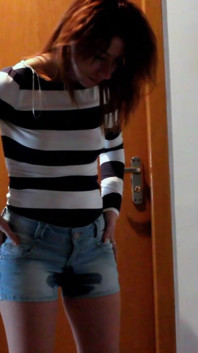 Skinny Redhead Pee in Her Short Jeans