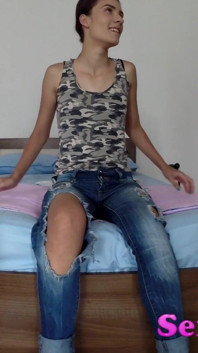 Skinny Brunette in Jeans Striping and Talking with Photographer